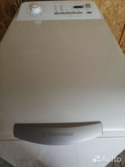 Стиральная машина с вертикальной загрузкой