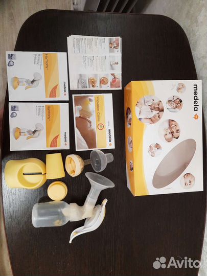 Молокоотсос medela ручной + соска Calma