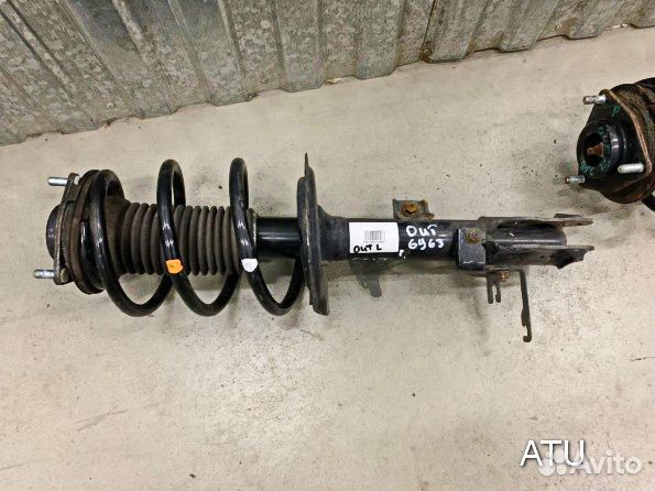 Стойка амортизатора передняя Митсубиши Аутлендер 3