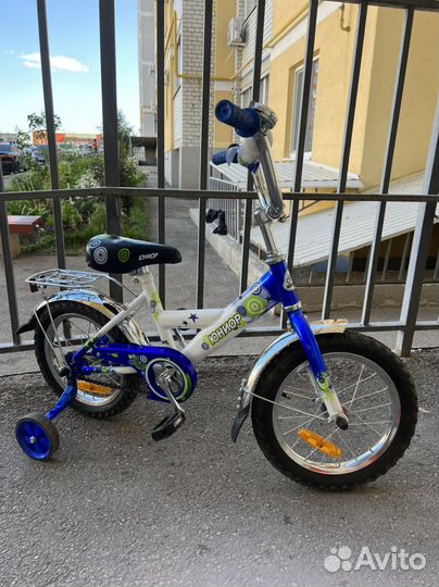 Четырехколесный велосипед