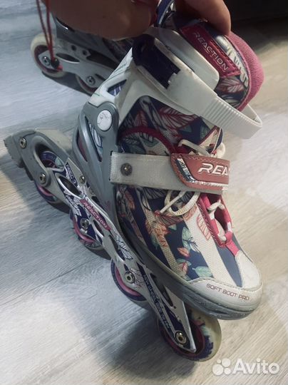 Роликовые коньки