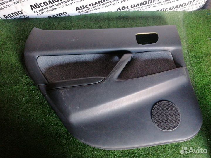 Обшивка двери задняя левая Toyota Vista SV40
