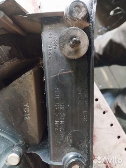 Фонарь задний левый лансер 9