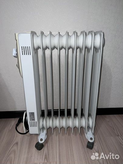 Масляный обогреватель