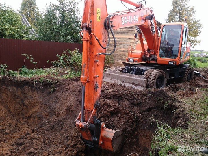 Услуги колесного экскаватора Doodan 180