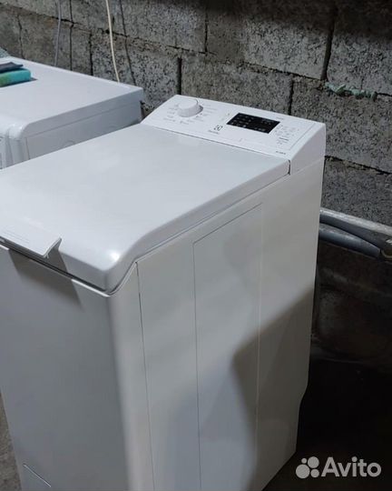 Стиральная машина с вертикальной загрузкой