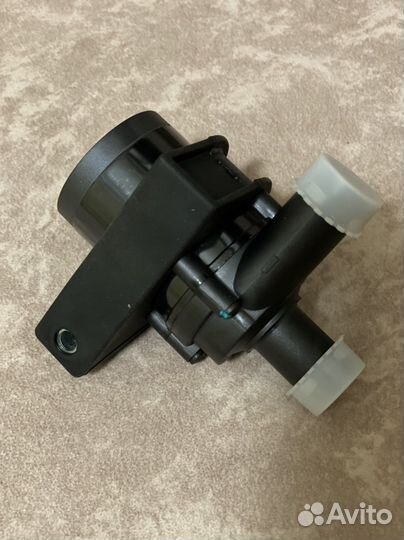 Помпа дополнительная электрическая 7H0965561A