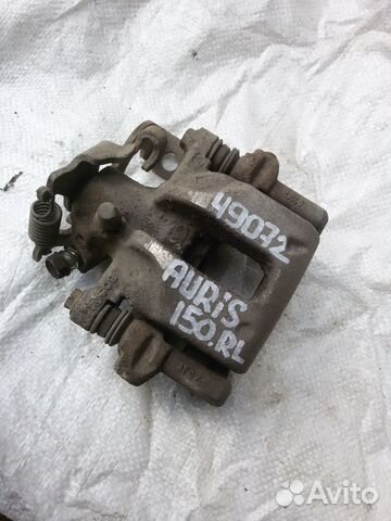 Суппорт тормозной Toyota Auris 150