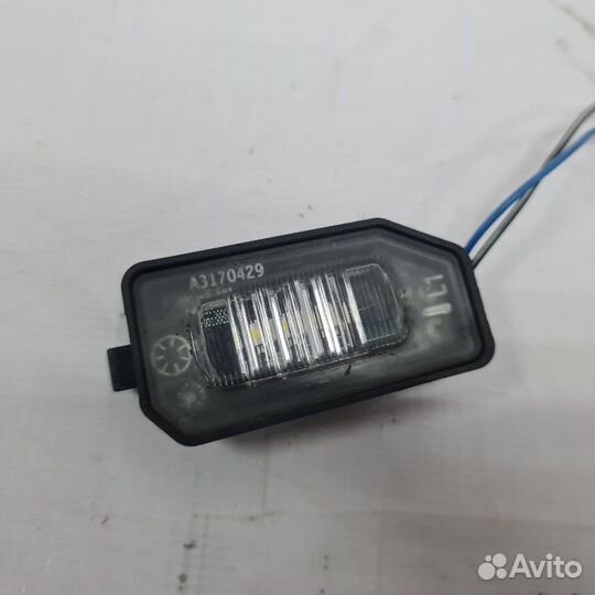 Фонарь подсветки номера левый Mercedes-Benz