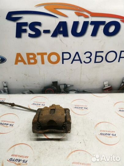 Суппорт тормозной передний правый Nissan Note 1.4