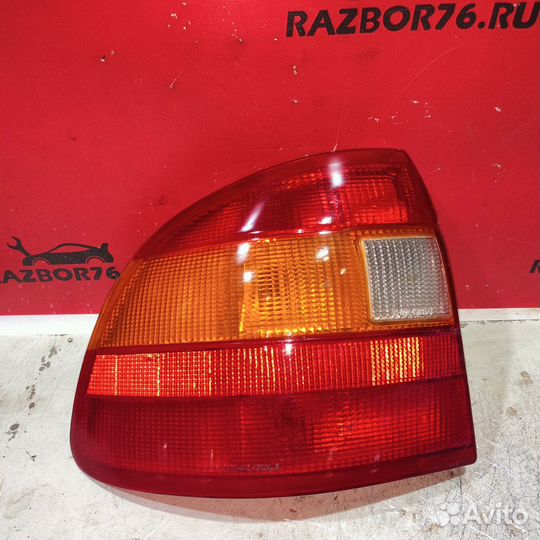 Фонарь левый Opel Astra F седан