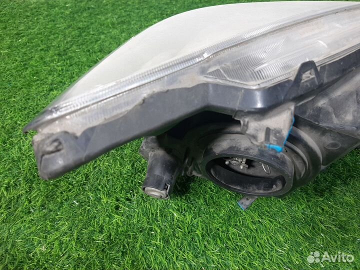 Фара левая Mitsubishi Lancer IX