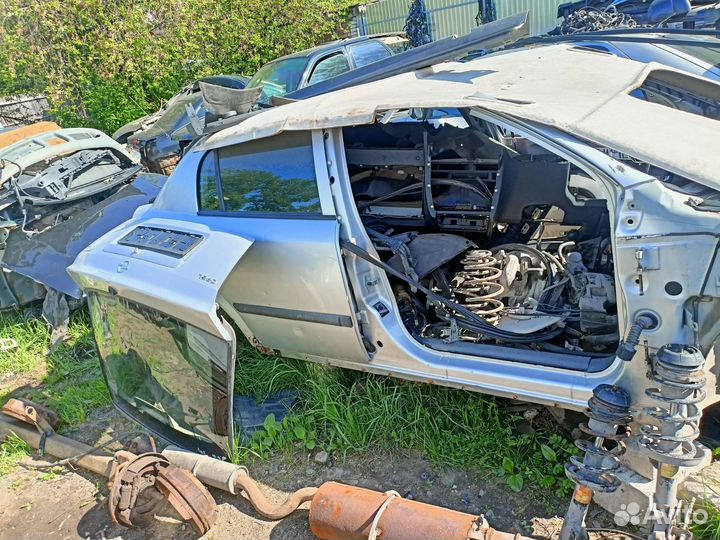 Передние стойки Оpel Astra G