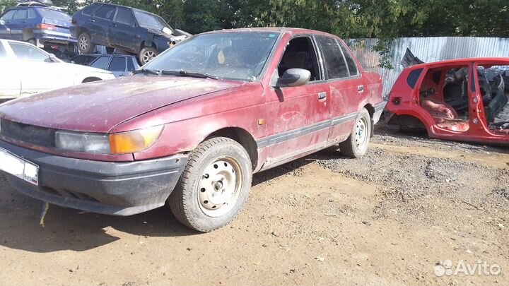 В разборе Mitsubishi Lancer 5