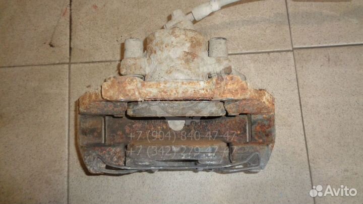 Суппорт передний правый Skoda Rapid 1