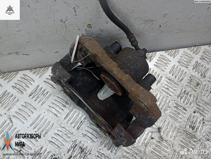 Суппорт передний левый Opel Astra G 2002