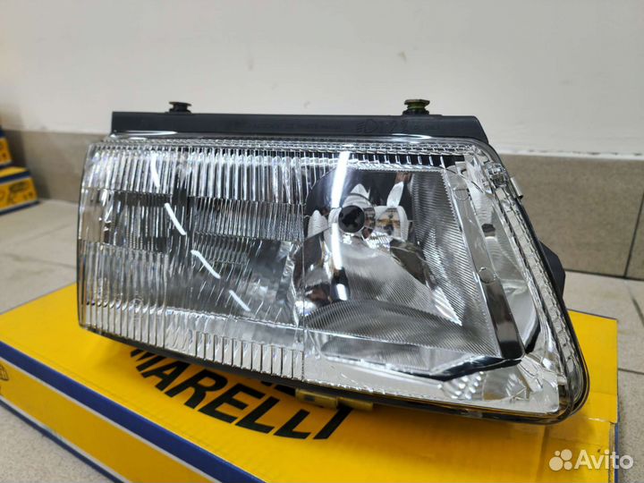 Передняя новая Hella фара VW Passat B5 (Без птф) R