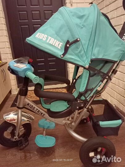 Трехколесный велосипед с ручкой