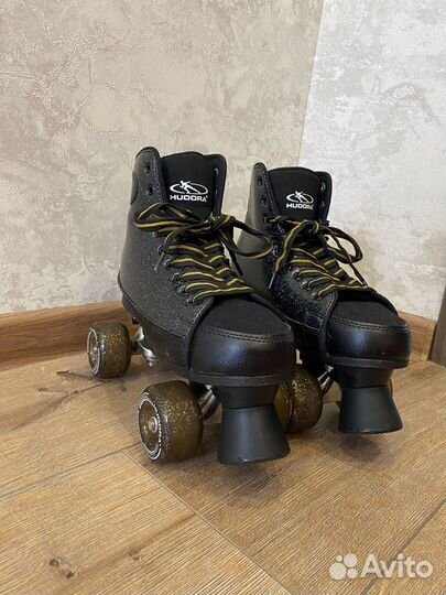 Продам классически роликовые коньки квады