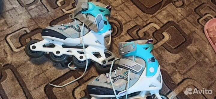 Роликовые коньки