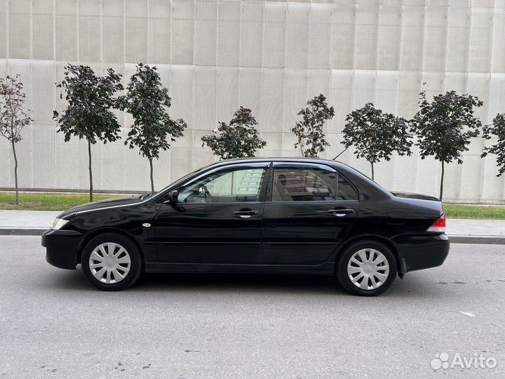 Mitsubishi Lancer 1.6 МТ, 2005, 150 000 км