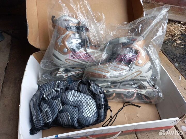 Роликовые коньки