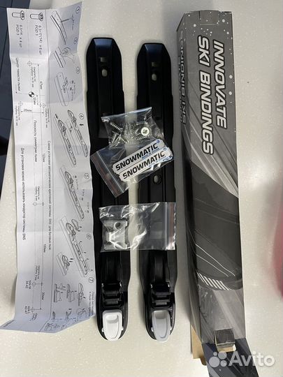 Ботинки и крепления для лыж