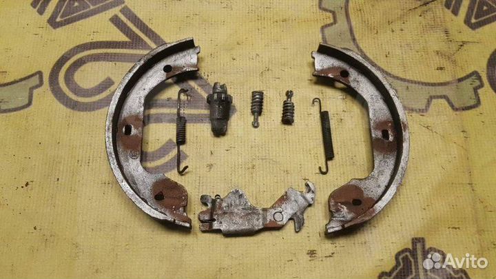 Механизм стояночного тормоза задний левый Bmw 525I