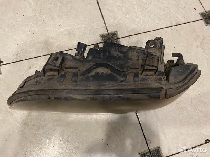 Фара передняя левая BMW E39