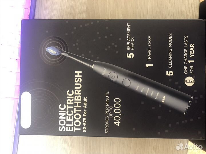 Электрическая зубная щетка