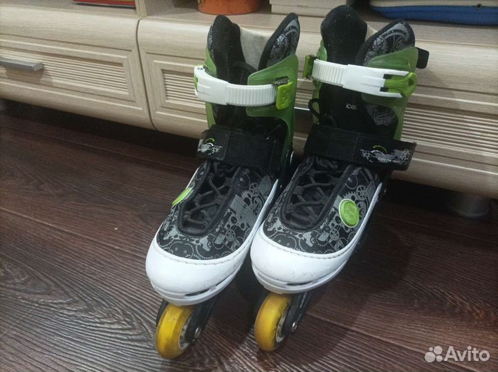 Роликовые коньки