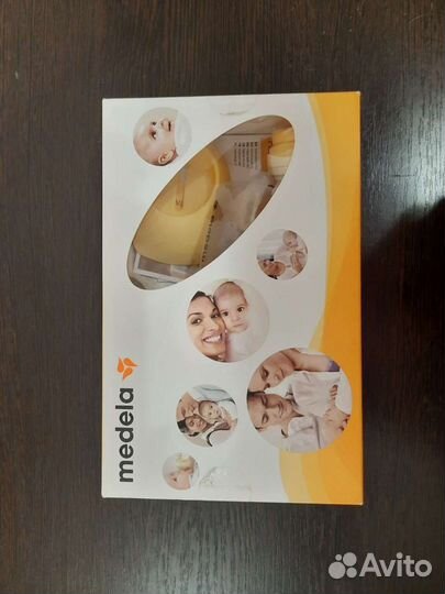 Молокоотсос medela ручной + соска Calma