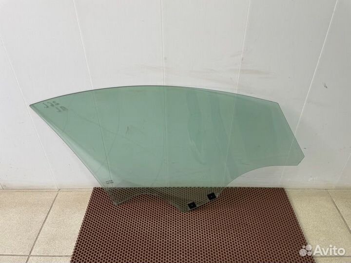 Стекло двери переднее левое Renault Logan
