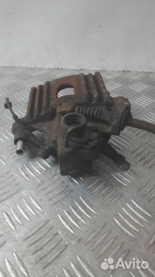 Суппорт тормозной задний правый Mini Cooper