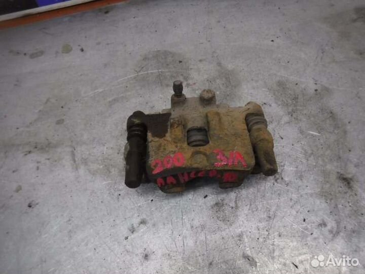 Суппорт задний левый Mitsubishi Lancer 10 4B10