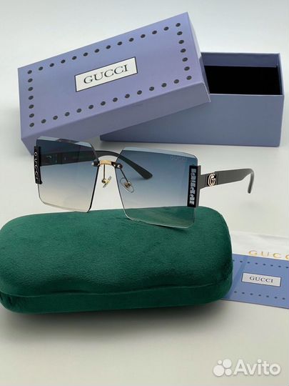 Солнцезащитные очки Gucci