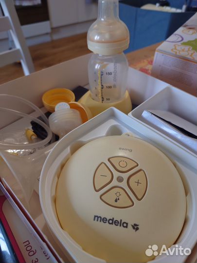 Молокоотсос medela