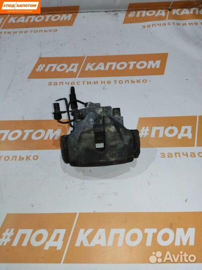 Суппорт тормозной передний левый Volkswagen Passat