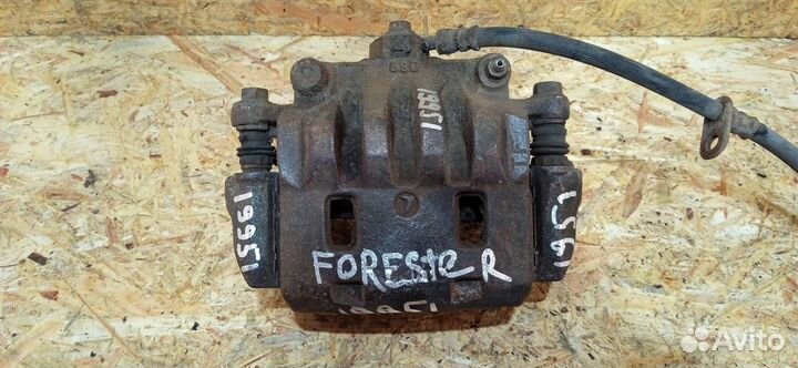 Суппорт тормозной передний левый Subaru Forester