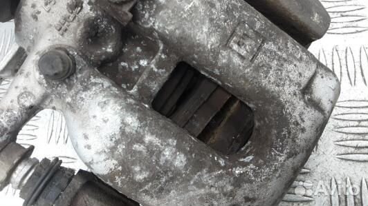 Суппорт тормозной задний левый opel astra K (83S18