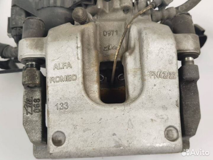 Суппорт тормозной задний левый Alfa Romeo Stelvio