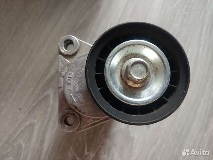 Натяжитель ремня приводного Ford,Volvo