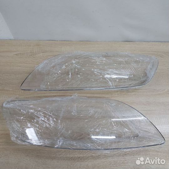 Стекла фар Audi Q7