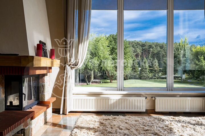 Коттедж 410 м² на участке 20 сот.