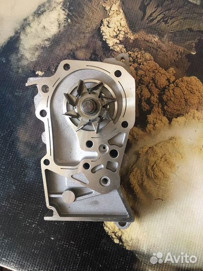 Помпа renault логан,ларгус 16 кл