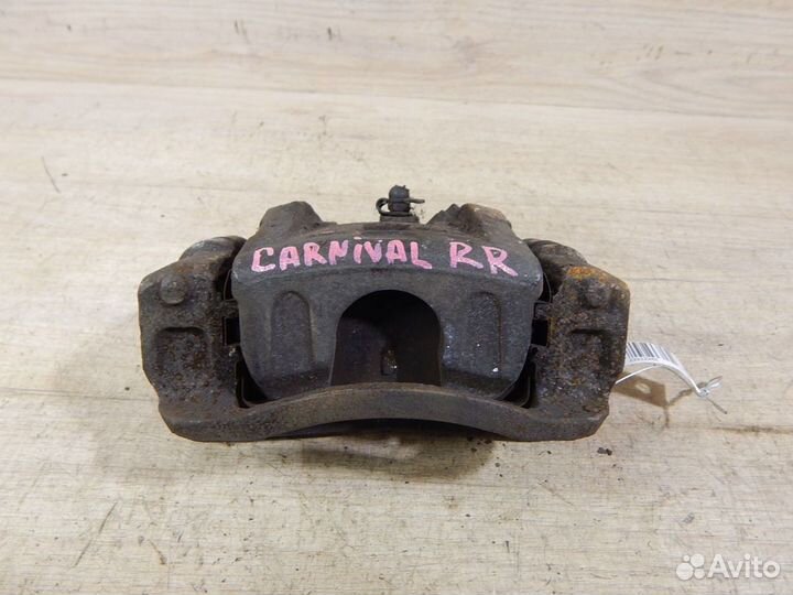 Суппорт задний правый Kia Carnival VQ