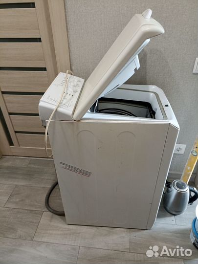 Стиральная машинка с вертикальной загрузкой