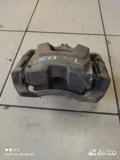 Суппорт тормозной передний левый Chevrolet Cruze