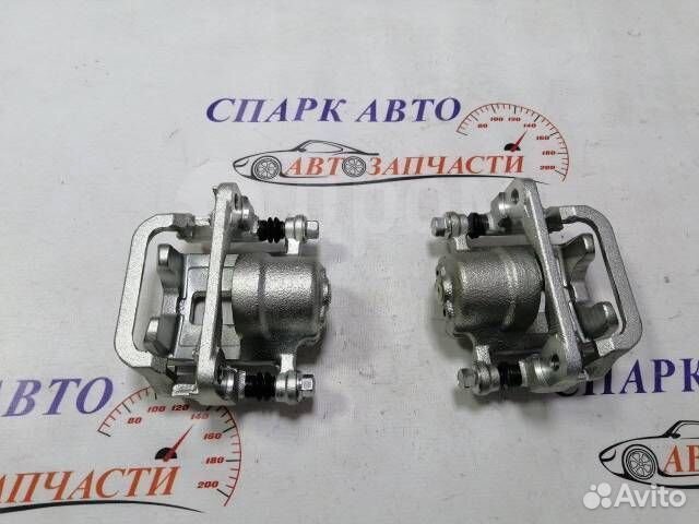 Суппорт тормозной задний левый/правый Nissan Muran