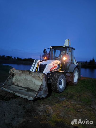 Услуги экскаватора- погрузчика